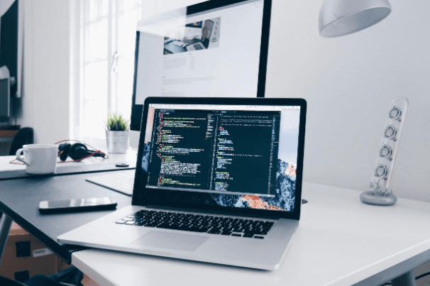Laptop on a white office desk