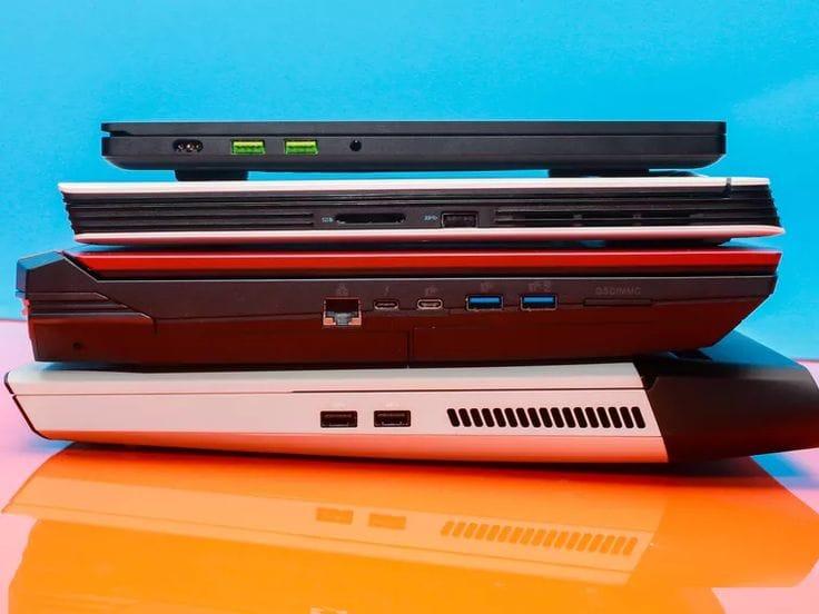 image of stack of laptops