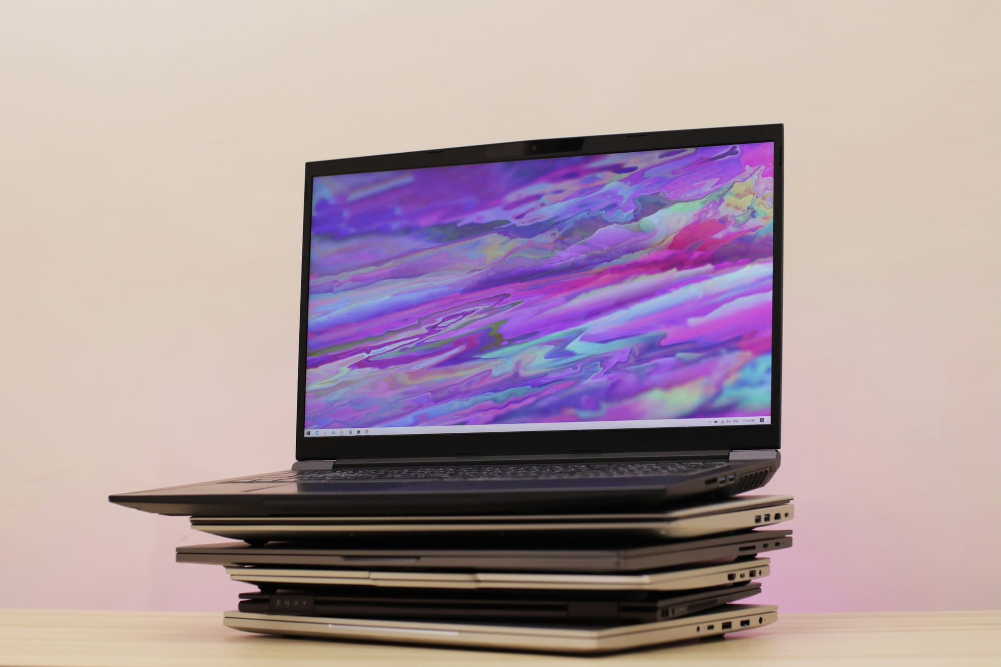 An image of a stack of laptops
